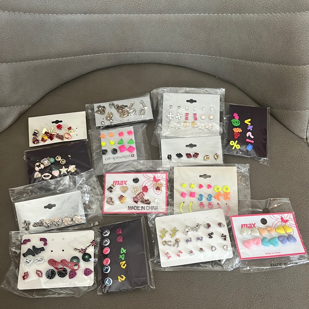 Lot of funky fancy earrings brand new